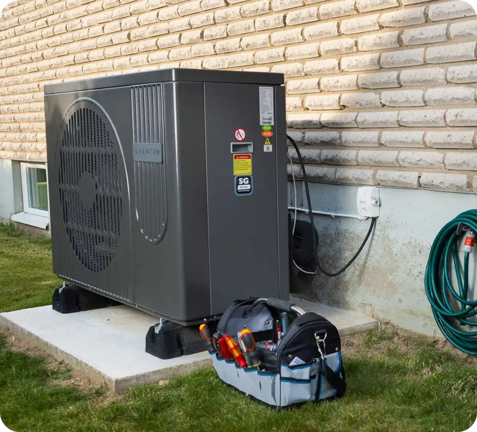 Air Source Heat Pump Being Serviced and Repaired